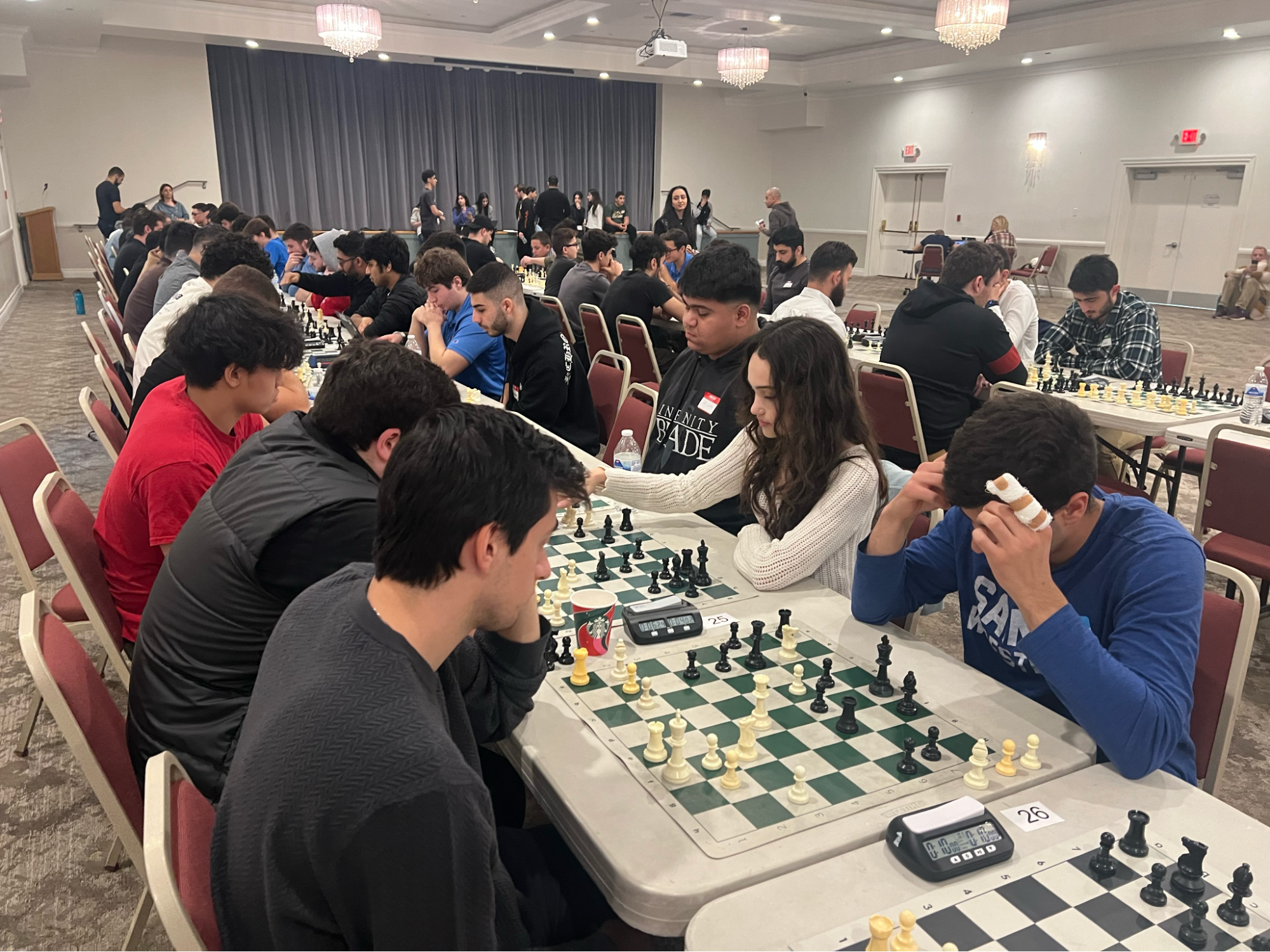 LA students gather to play chess for Artsakh